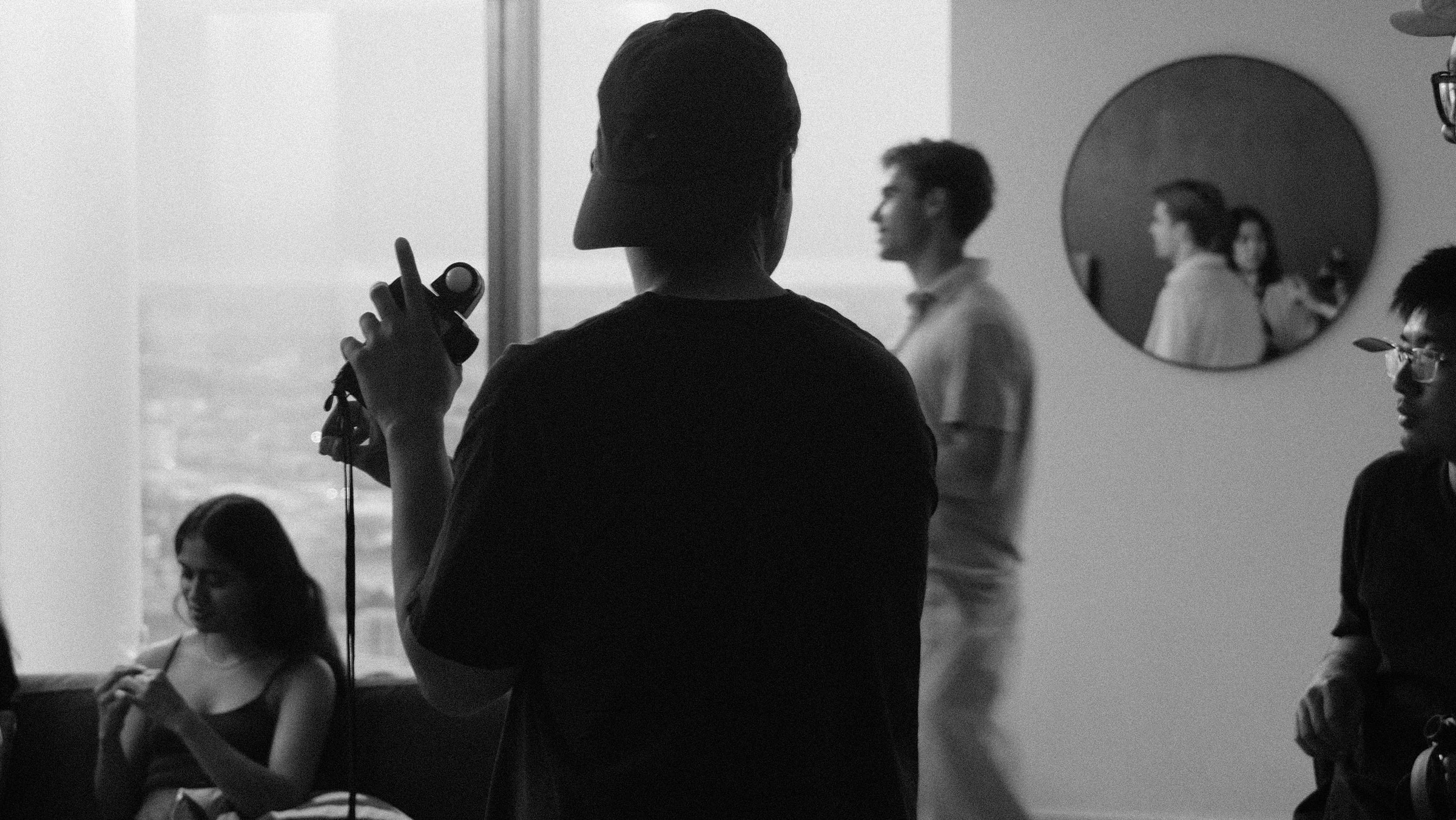 Crew members preparing a shot in a high-rise apartment
