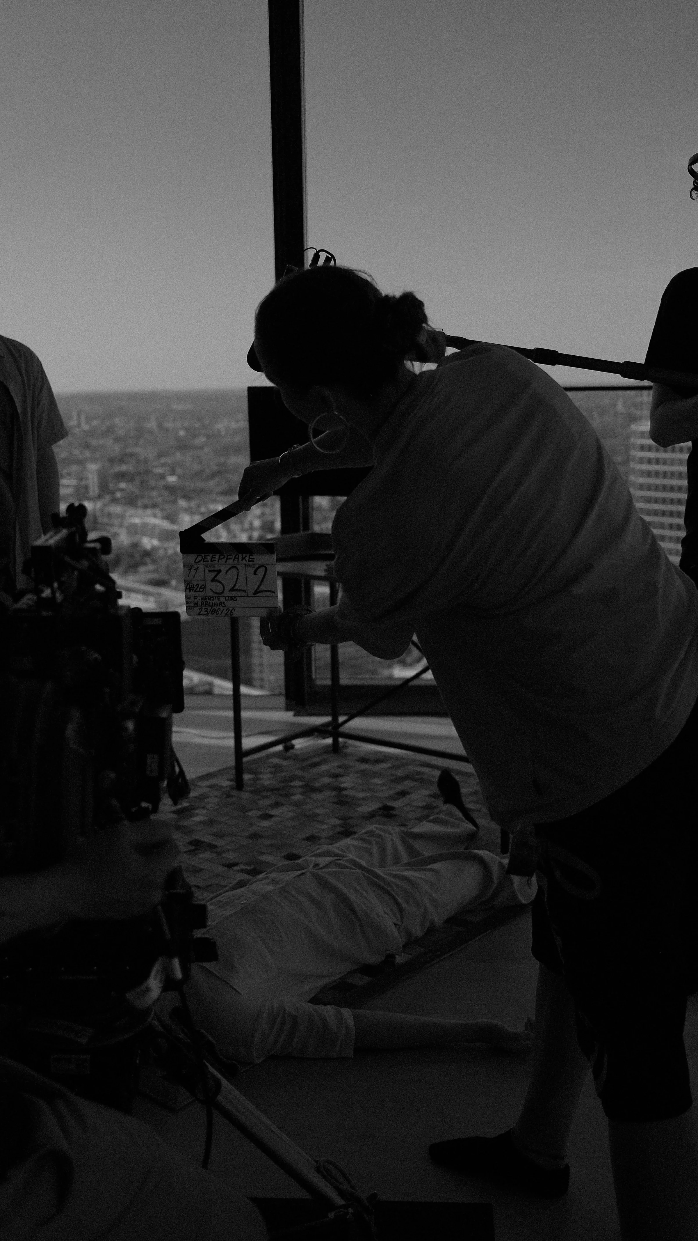 Clapperboard held in front of a cinema camera